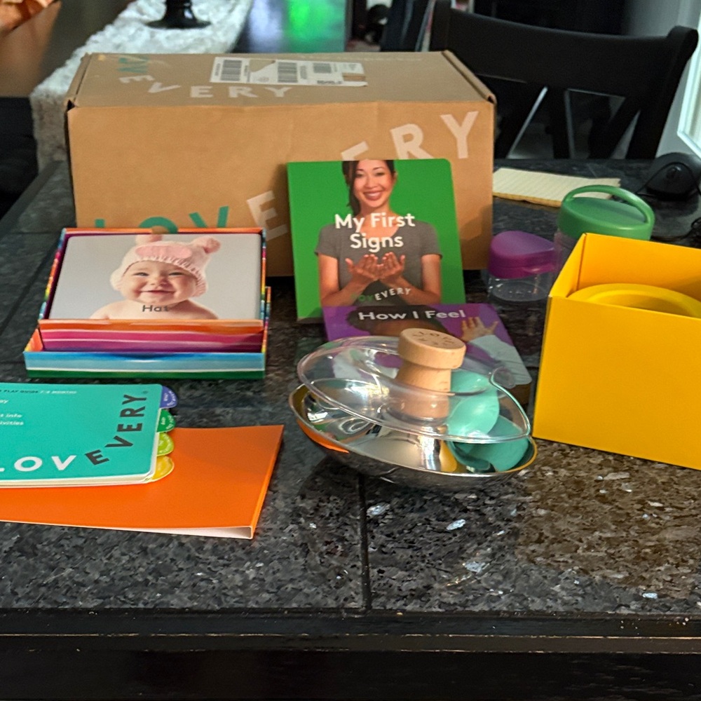 Lovevery collection of toys and books. Most from 7-8 and 9-10 months